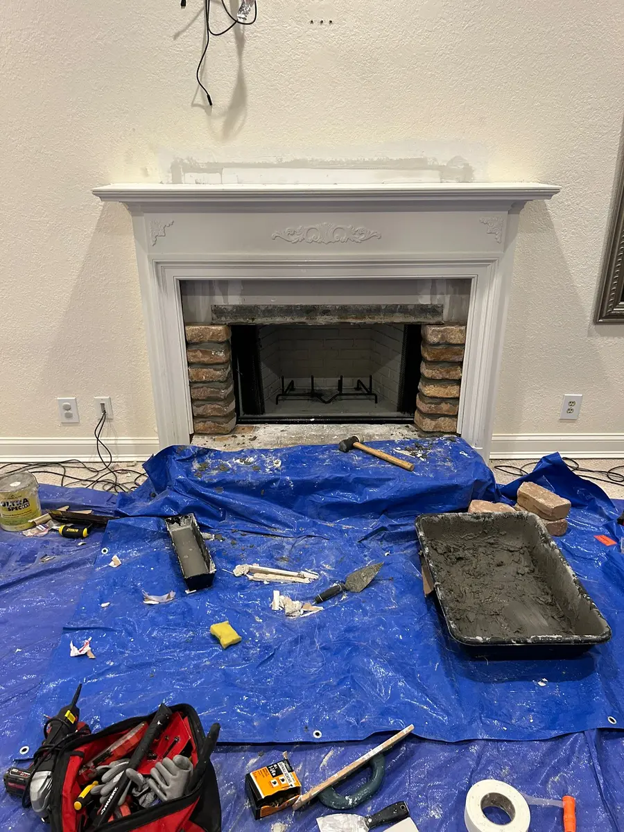 Fireplace repair tools and protected work area