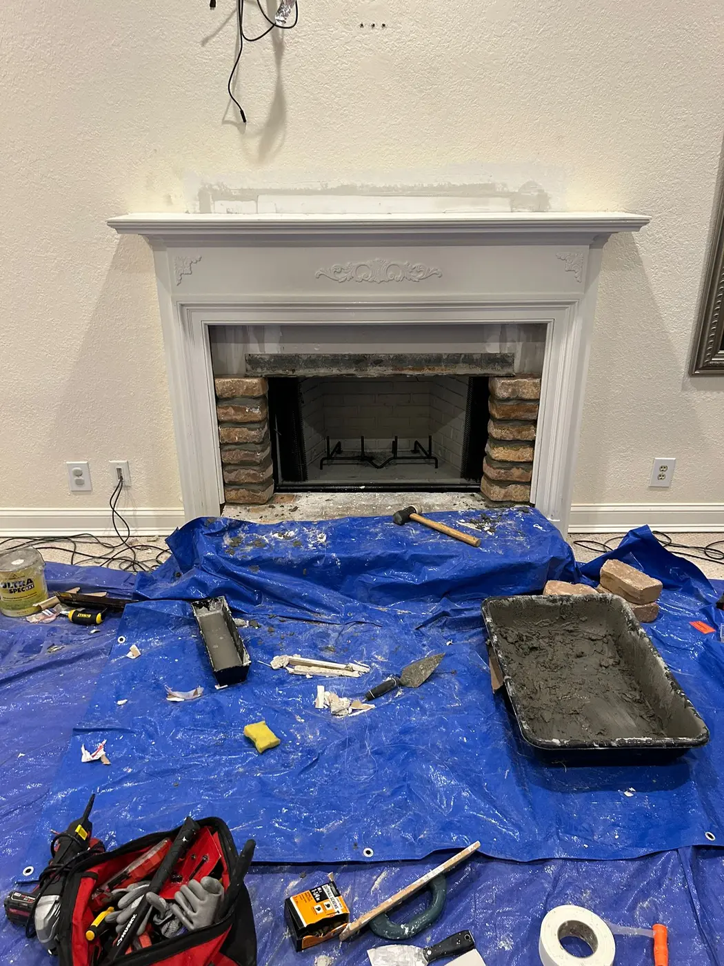 Fireplace repair tools and protected work area