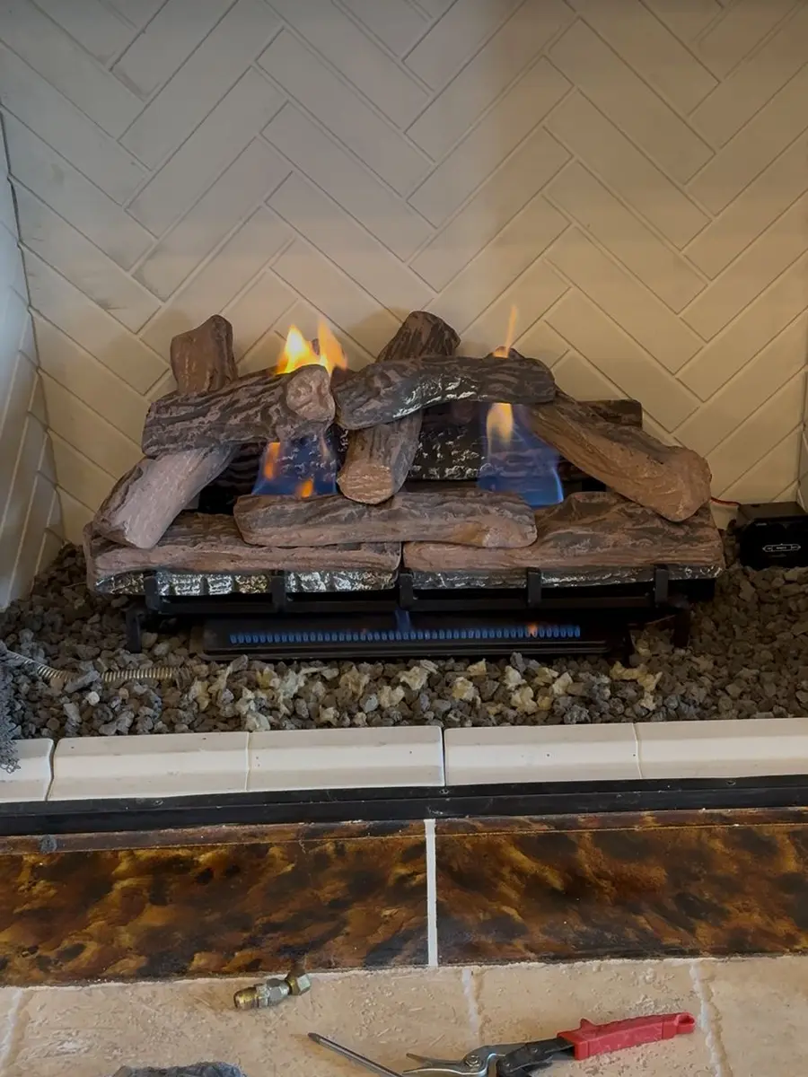Gas fireplace service in progress