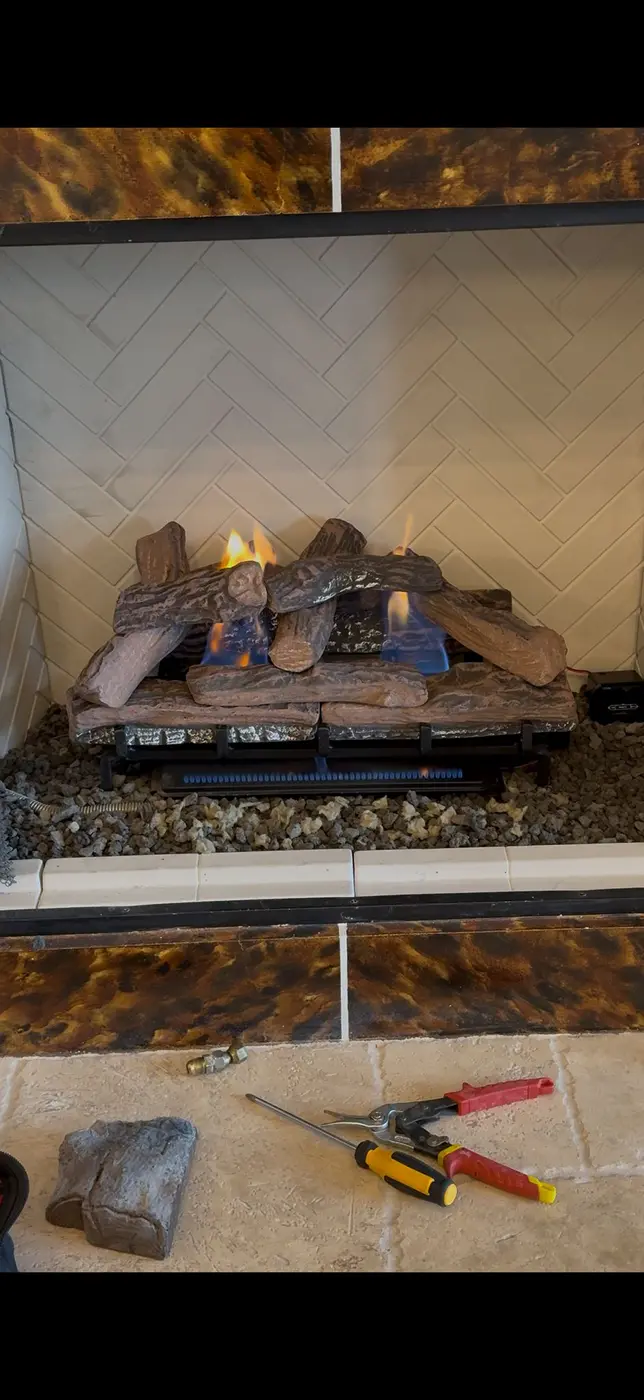 Gas log installation in a South Florida fireplace
