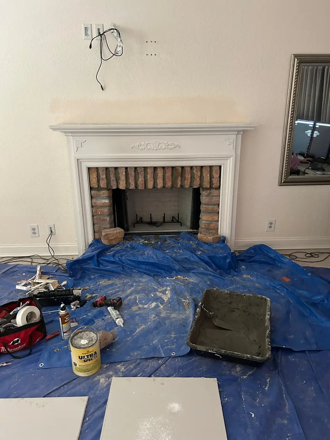Floor and fireplace protected before service