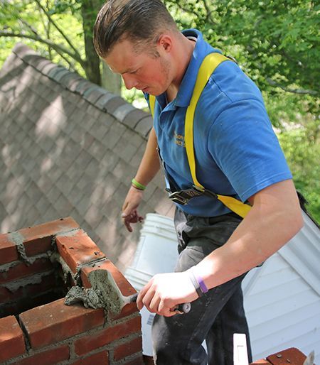 Masonry rebuild at the top of a chimney